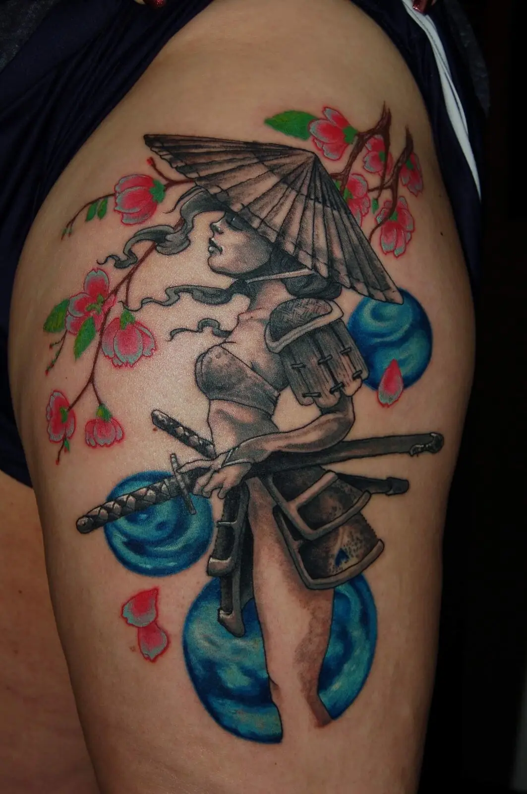 Neo traditional female samurai with parasol and cherry blossoms on thigh